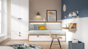 dormitorio juvenil con escritorio colgado y cama con repisa. Este dormitorio juvenil está disponible en multitud de medidas y colores.